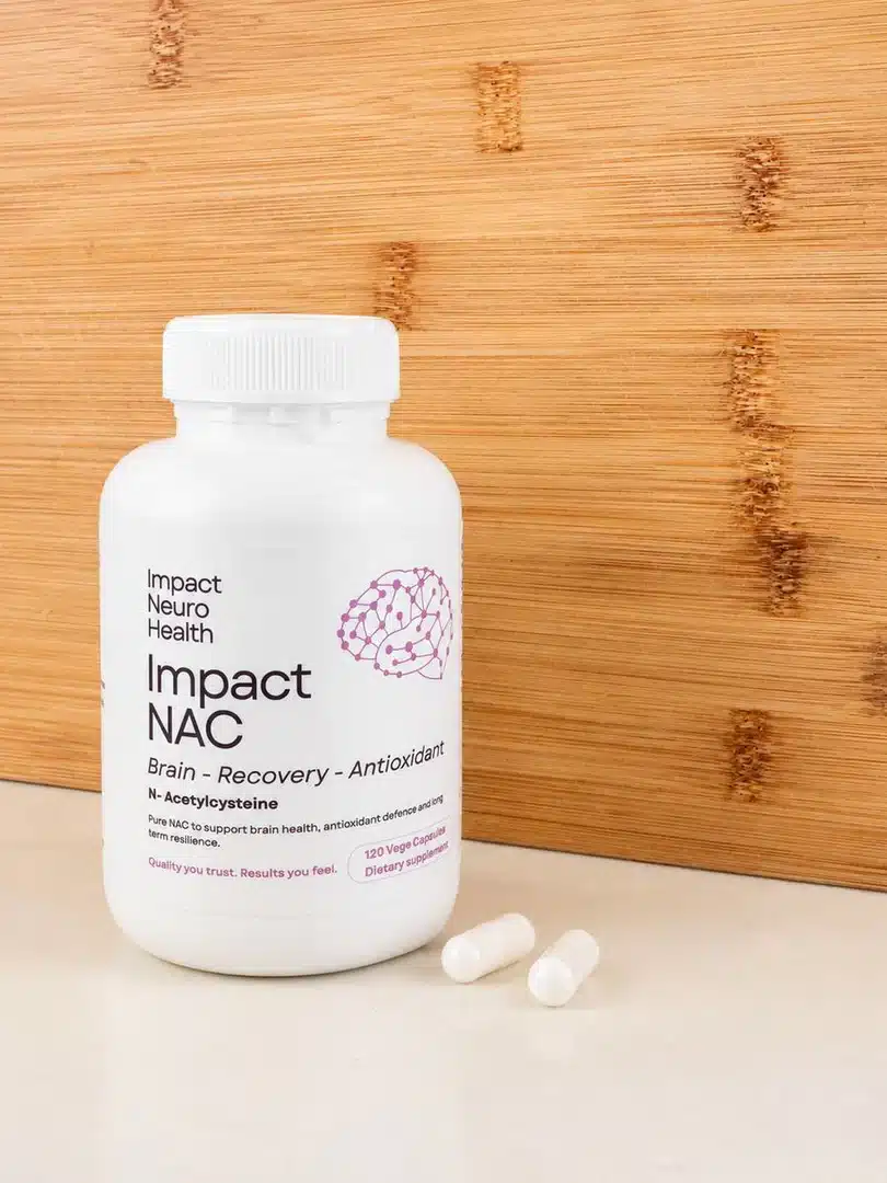 Impact NAC bottle with capsules on kitchen bench